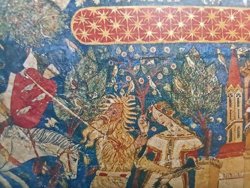 Detalle de una de las pinturas de las bóvedas laterales de la Sala de los Reyes